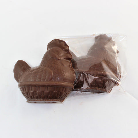 A solid chocolate Easter Mother Hen in milk chocolate in clear packaging against a white background.